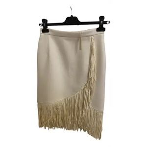 Maje fringe skirt as pictured. Fits more like a 2